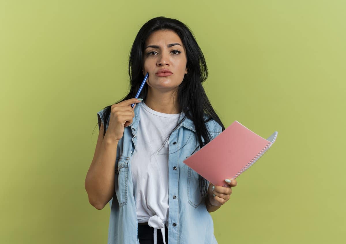 Students preparing for JEE Main 2026 with books and calendar